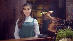 beautiful waitress serving in cafe Stock Footage