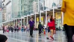 People walking in front of shopping mall,tilt down shot Stock Footage