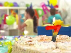 HD DOLLY: Birthday Cake With Number 7 Candle Stock Footage