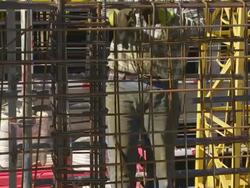 Worker Tying the Rebar on Constrution Site CU Stock Footage