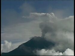 WA grey smoke and ash cloud billow from crater into sky, cloud obscuring view, Mount Tunguragua, Ecuador Stock Footage