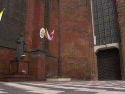 Statue John Paul II with divine infant Stock Footage