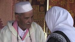 CLEAN : Pilgrims cast prayers to the skies from Algeria mountain peak News Clip