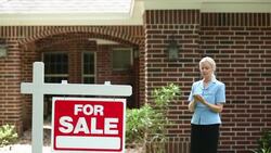 Real estate agent using smart phone. Home, sign. Stock Footage