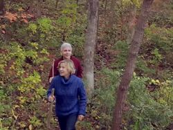 WS Mature couple hiking / Sea Bright, New Jersey, USA Stock Footage
