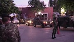 Army officials at TV station as military declares martial law in surprise move News Clip