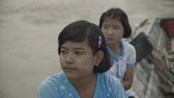 W/S Burmese teenage girls in a motorboat Stock Footage