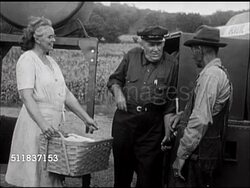 1947: STANDARD OIL (INDIANA): SALESMEN: Salesman 'George Meyn' on sales call at farm, SOT George greeting woman w/ laundry basket, talking w/ farmer about helping sick neighbor, unidentified farmer saying he'll help plow, can depend on him. Instructional Video