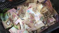 Venezuelans scramble as currency woes continue   Instructional Video