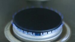 Close-up of flames from cooking element on natural gas kitchen stove Stock Footage