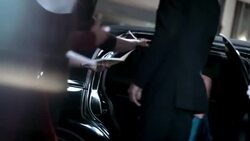 Celebrity couple step out of limousine and sign autographs for fans on red carpet at awards show Stock Footage