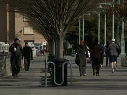 People walk and exercise at the Hudson River Park on the West Side of Manhattan Stock Footage