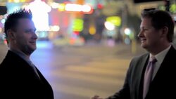Two businessmen shake hands on The Strip in Las Vegas. Stock Footage