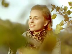 Young woman taking photos with retro camera Stock Footage