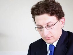 Male business professional in discussion Stock Footage