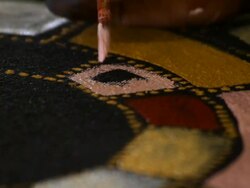 CU Shot of brush on canvas of tiwi art / Northern Territory, Australia Stock Footage