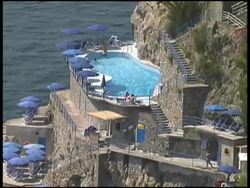 Secret Pool On Waterfront Mountainside: Pull to Wide Stock Footage