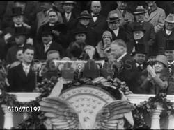 1929: POLITICS: INAUGURATION: HA WS People in tree, Calvin Coolidge shaking hands w/ President-elect Herbert Hoover on  Capitol Building east portico, WS Crowd w/ umbrellas, WS President Hoover at podium (No SOT), WS  Calvin & Grace Coolidge on train. Instructional Video