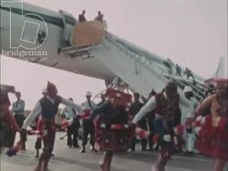 Supersonic Preview part 2 - Mexican dancers welcome the arrival of a Concorde plane. Crowds gather to admire the Concorde in various international airports. c.1976 Stock Footage