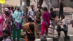 Factory workers clash with police News Clip