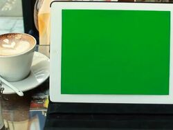 Woman hand using digital tablet at coffee cafe Stock Footage
