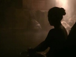 Woman enjoys hot spring Stock Footage