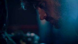 Man in motorcycle workshop building a bike Stock Footage