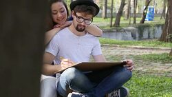 Young painter drawing in the park Stock Footage