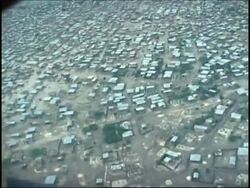 Aerials of city under water and cut off from rest of country News Clip