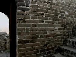 Inside the Great Wall of China, looking up steps that lead to a tower. Stock Footage