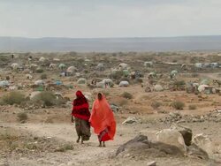 WS View of entrance of refugee camp in Djibouti with tents made of scrap plastic sheets / Djibouti refugee camp, Djibouti Stock Footage