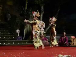 MS PAN View of Balinese girl dancers performing Legong Dance in Puri Saraswati temple AUDIO / Ubud, Bali, Indonesia Stock Footage