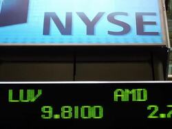 View of NYSE sign and ticker above trading floor of New York Stock Exchange New York City Stock Footage