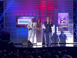 SPEECH - Ed Gordon, Holly Robinson Peete, and mayor of Atlanta Kasim Reed presents best school teacher sponsored by Walmart at 2014 Ford Neighborhood Awards Hosted By Steve Harvey at Phillips Arena on August 09, 2014 in Atlanta, Georgia Stock Footage