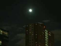 MS Backplate of highrise building with full moon at night / New York, New York, USA Stock Footage