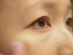 Asian woman applying make up(toner) Stock Footage