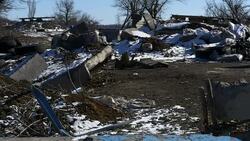 Pro Russian rebels stood around next to tank News Clip