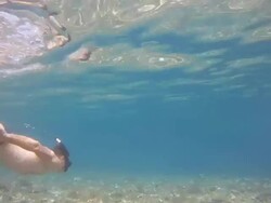 HD: Swimmer Snorkeling In Shallow Water Stock Footage