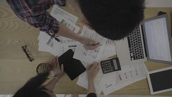 Business person analyse financial data in overhead angle Stock Footage