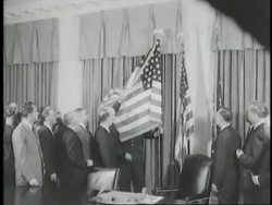 President Eisenhower reveals the American flag with forty-nine stars upon Alaska's statehood. News Clip