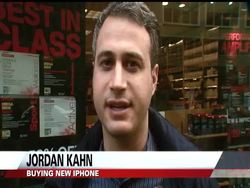 People lined up early and braved some rain to get their hands on the new iPhone 4S in Washington Friday. (Oct. 14) News Clip