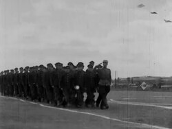 Young soldiers exercise in front of Kim Il Sung Stock Footage