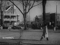 1952: ELKHORN CHRISTMAS: CU Map w/ wax pencil circling small Midwestern town of Elkhorn in Wisconsin, WS Park & houses, Angled WS The Elkhorn Independant newspaper office, man working printing press, Editor Claude Ames checking newspaper. Midwest. Instructional Video
