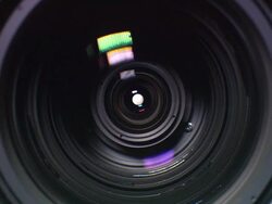 Close up camera lens focusing Stock Footage