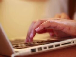 Woman using laptop Stock Footage