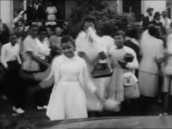 B/W 1963 Black woman + 2 girls cheer on marchers at civil rights demonstration / Alabama / newsreel Stock Footage