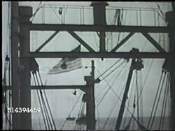 1943: ALEUTIAN ISLANDS CAMPAIGN: KISKA INVASION: VS United States Navy transport ship at sea, U.S. 7th Infantry Division on deck polishing rifles, preparing grenades (unconfirmed) from crates, soldiers standing & watching out to sea. WWII, Pacific Instructional Video