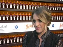 INTERVIEW: Carly Chaikin on why she is there, her plans this summer and her favorite Olympic sport at Cointreau And Dita Von Teese Launch Cointreau Poolside Soirees In Celebration Of The Beverly Hills Hotel's 100th Anniversary in Beverly Hills, 07/11/12 Stock Footage