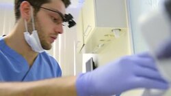 Young dentist working Stock Footage
