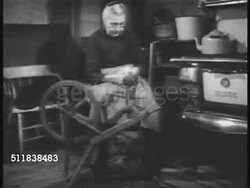 1940: NEW YORK IMMIGRANTS: VS German immigrant tombstones. German-American elder woman in kitchen spinning thread by stove, elder male smoking pipe, men playing cards at social club table. Instructional Video